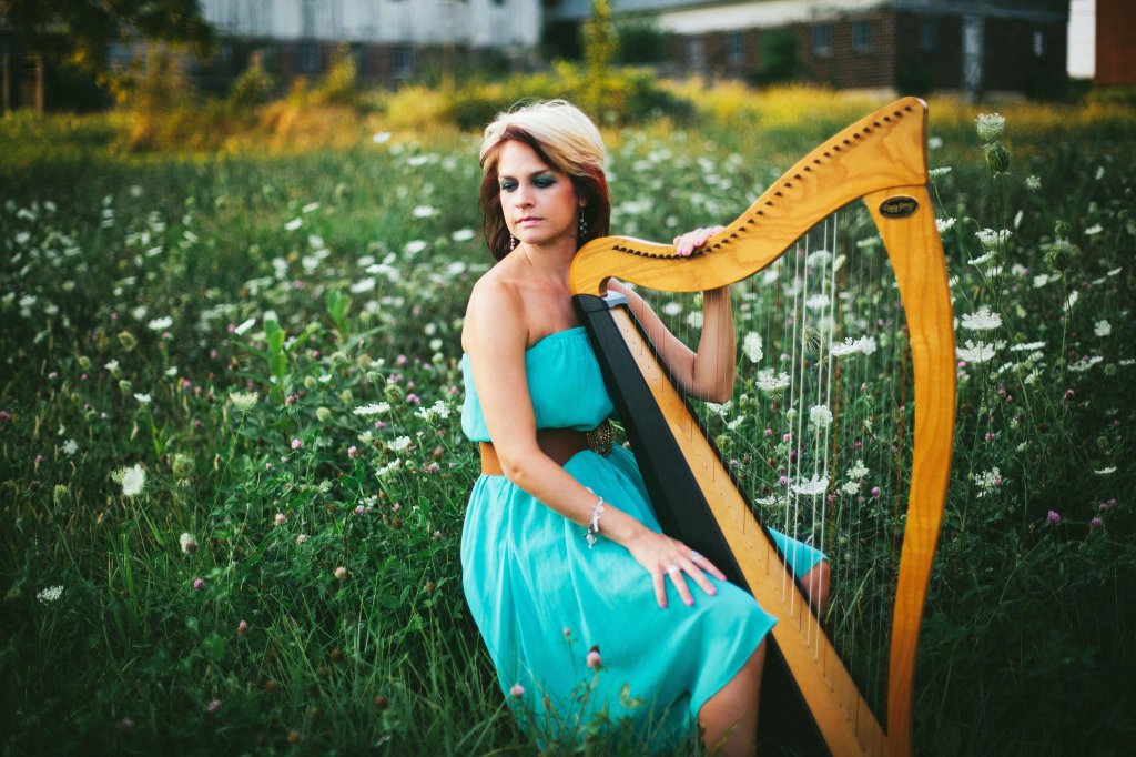 Lydia Bandy playing the harp